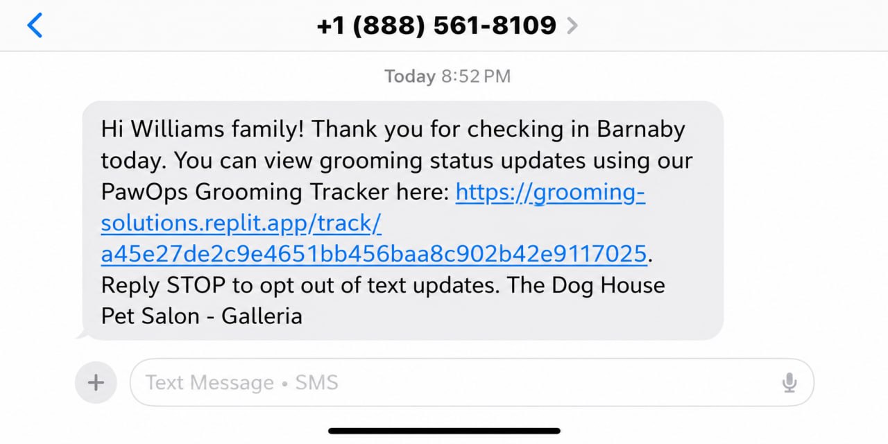 PawOps SMS check-in notification showing grooming status tracking link